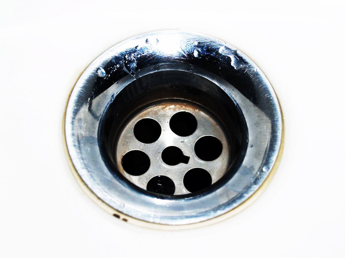 A chrome sink drain